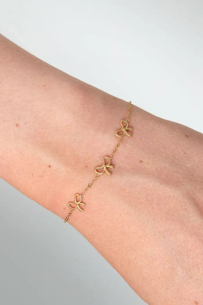 Three Bowties armband Goud