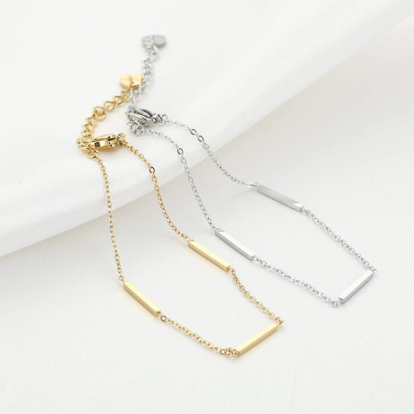 Three Details armbandje goud/zilver