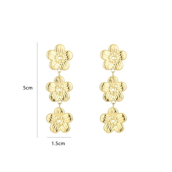Triple bloemen oorbellen goud
