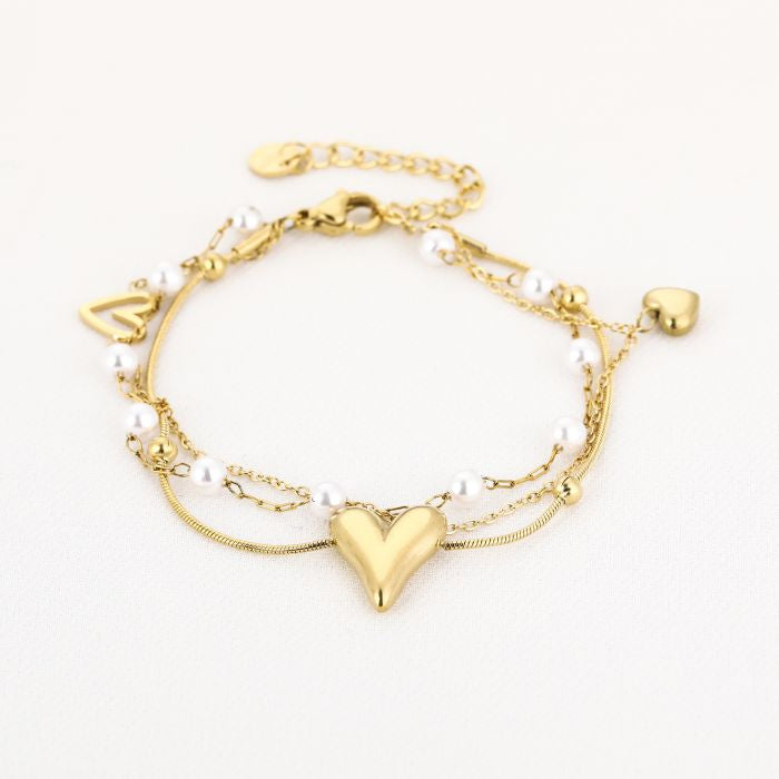 Dubbele hartjes en parels armbandje Goud