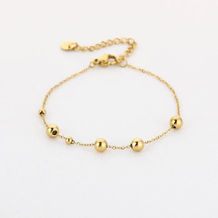 Bolletjes kralen armband goud