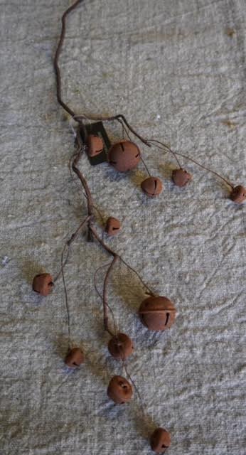 Slinger met roestbellen M