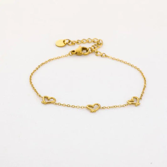 Drie Hartjes armband goud